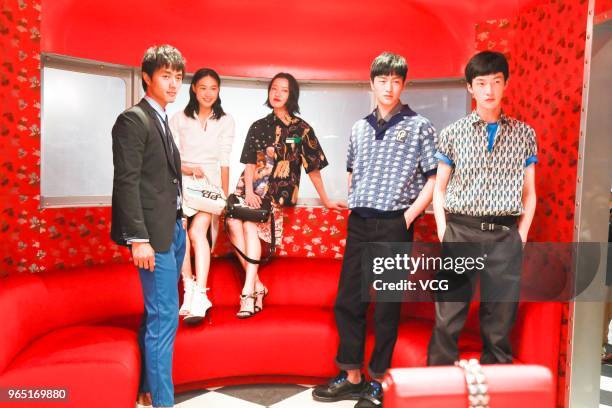 Model Zhao Lei, model Qin Shupei, actress and model Du Juan and model Jin Dachuan attend the opening ceremony of Prada store at the Beijing SKP on...