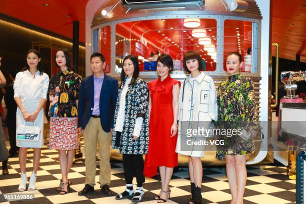 Model Qin Shupei, model and actress Du Juan, actress Faye Yu and actress Yuan Quan attend the opening ceremony of Prada store at the Beijing SKP on...