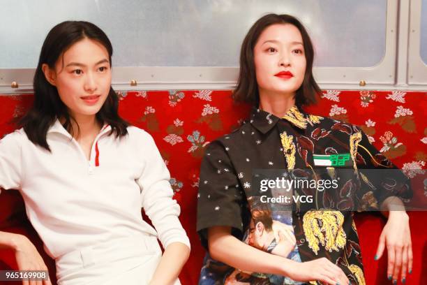 Model Qin Shupei and model and actress Du Juan attend the opening ceremony of Prada store at the Beijing SKP on May 31, 2018 in Xi'an, Shaanxi...