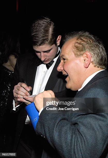 New York Rangers forward Brandon Dubinsky signing a business card for a guest during casino night to benefit the Garden Of Dreams Foundation at...