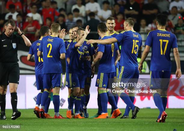 Edin Visca of Bosnia & Herzegovina celebrates after scoring a second goal during the international friendly match between South Korea and Bosnia &...