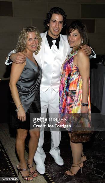 New York Rangers rookie defenseman Michael Del Zotto poses with guests during casino night to benefit the Garden Of Dreams Foundation at Gotham Hall...
