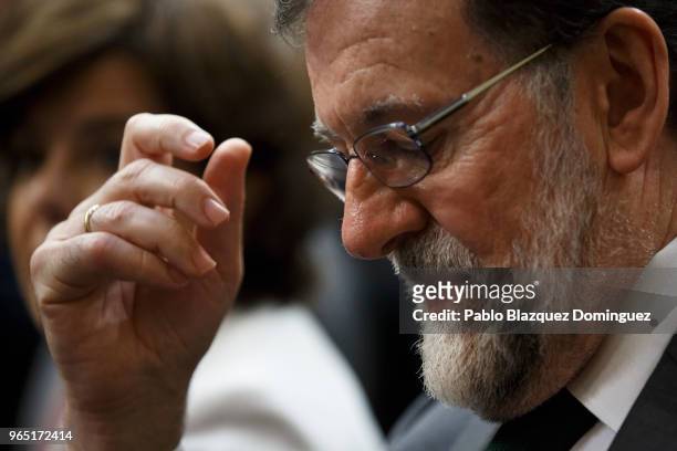 Spanish Prime Minister Mariano Rajoy looks down before the voting for the no-confidence motion at the Lower House of the Spanish Parliament on June...