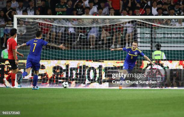 Edin Visca of Bosnia & Herzegovina celebrates after scoring a third goal during the international friendly match between South Korea and Bosnia &...