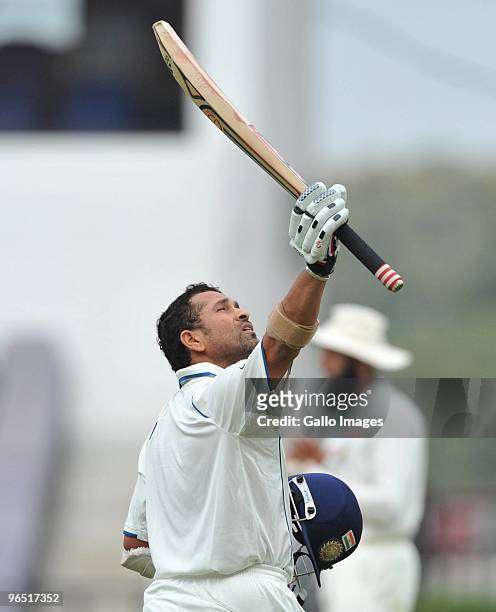 Sachin Tendulkar of India runs a single and celebrates his 100 during day 4 of the 1st test between India and South Africa at Vidarbha Cricket...