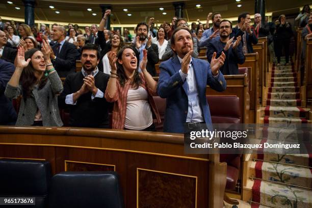 Pablo Iglesias , Irene Montero and other members of Podemos party celebrate the result of the no-confidence motion at the Lower House of the Spanish...