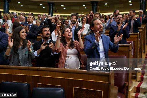 Pablo Iglesias , Irene Montero and other members of Podemos party celebrate the result of the no-confidence motion at the Lower House of the Spanish...