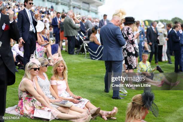 Racegoers await the start of Ladies Day during the Investec Derby Festival at Epsom Downs on June 1, 2018 in Epsom, England.