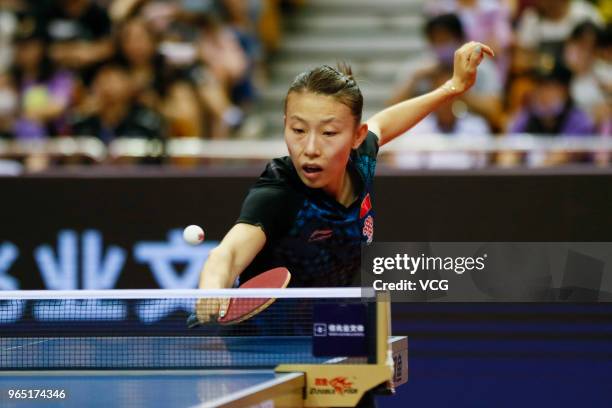 Wu Yang of China competes in the Women's Singles first round match against Mima Ito of Japan during day two of the 2018 ITTF World Tour China Open at...