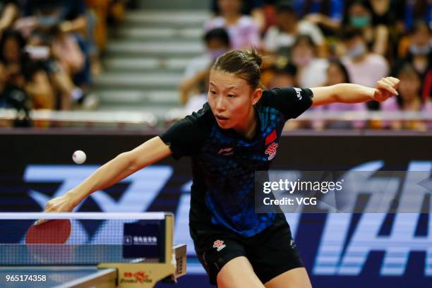 Wu Yang of China competes in the Women's Singles first round match against Mima Ito of Japan during day two of the 2018 ITTF World Tour China Open at...