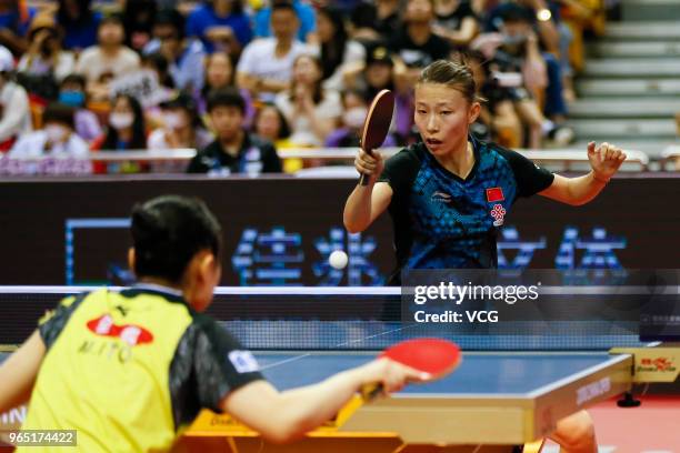 Wu Yang of China competes in the Women's Singles first round match against Mima Ito of Japan during day two of the 2018 ITTF World Tour China Open at...