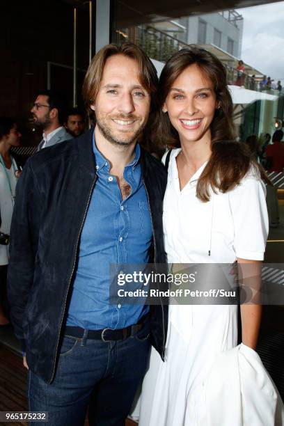 Host Ophelie Meunier and her husband Mathieu Vergne attend the 2018 French Open - Day Six at Roland Garros on June 1, 2018 in Paris, France.