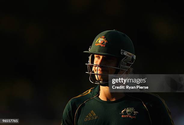 Shane Watson of Australia walks from the ground after being dismissed by Kemar Roach of the West Indies during the second One Day International...