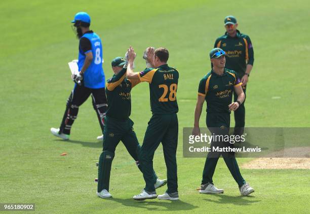 Jake Ball of Nottinghamshire is congratulated after bowling Moeen Ali of Worcestershire during the Royal London One-Day Cup match between...