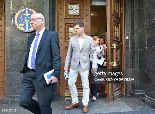 Group of diplomats from Germany, Canada, the United States, France, Britain, Italy and Japan, leave a meeting at Ukraine's General Prosecutor office...