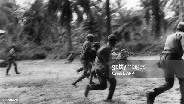 Biafran rebel soldiers are seen during an attack to take the city of Ikot Ekpene from the Nigerian troops, 11 August 1968, during the Biafra war. A...