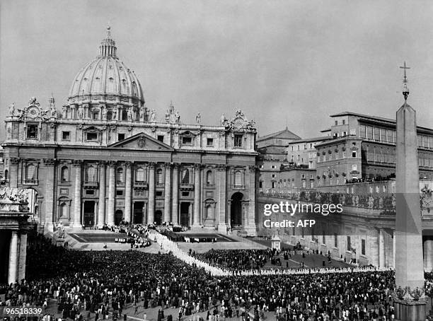View of the procession of the Council Fathers 11 October 1962 in front of Saint Peter's Basilica at the Vatican, at the opening of the first session...
