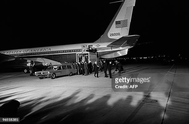 Navy ambulance, near Air Force One, waits for the body of slain President John Fitzgerald Kennedy, assassinated in Dallas, and US first lady...