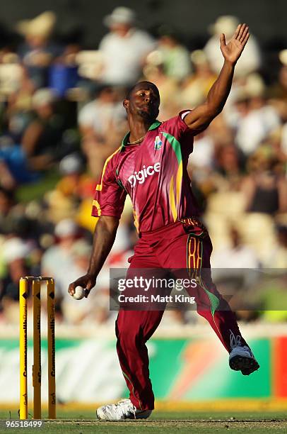 Dwayne Smith of the West Indies bowls during the second One Day International between Australia and the West Indies at Adelaide Oval on February 9,...