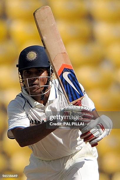 Indian cricketer Subramaniam Badrinath bats on the third day of the first cricket Test match between India and South Africa in Nagpur on February 8,...