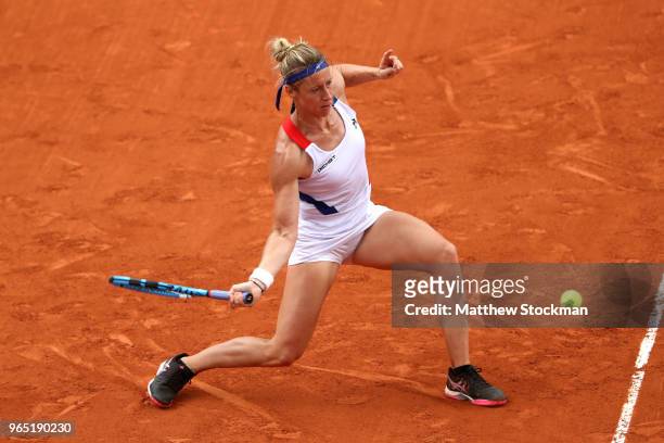 Pauline Parmentier of France plays a forehand during her ladies singles third round match against Caroline Wozniacki of Denmark during day six of the...