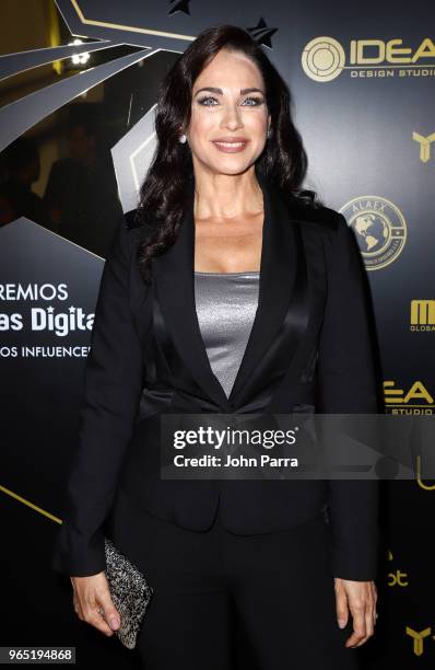 Carmen Dominicci arrives at Premios Estrellas Digitales 2018 at James L. Knight Center on May 31, 2018 in Miami, Florida.