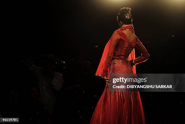 An Indian model presents a creation from the designer Arshi Jamal, during the first day of the Bangalore Fashion Week in Bangalore on January 28,...