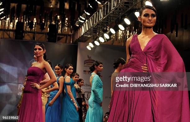 Indian models present creations of designer Swapnil Shinde, during the first day of the Bangalore Fashion Week in Bangalore on January 28, 2010. A...