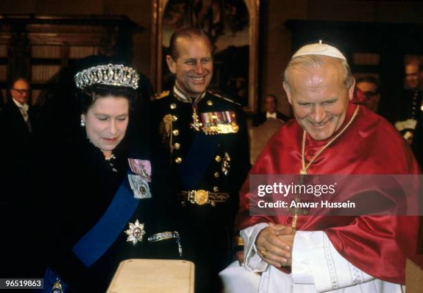 Queen Elizabeth ll and Prince Philip, Duke of Edinburgh meet Pope John Paul ll on October 17, 1980 at the Vatican in Rome, Italy.