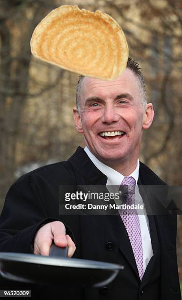 Gary Rhodes flipping pancakes at a photocall for the annual charity Parliamentary Pancake Race at Victoria Tower Gardens on February 9, 2010 in...