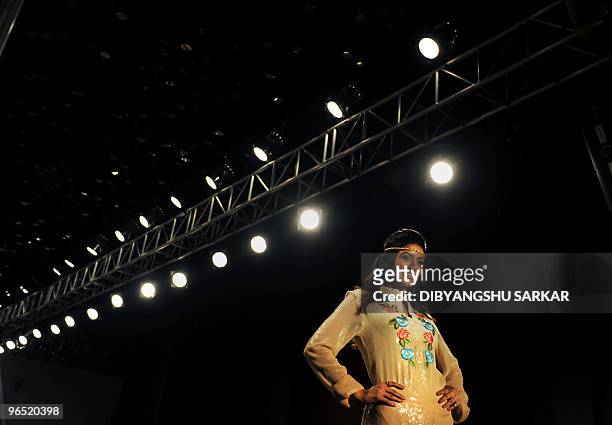 Indian models present the creation of designer Preeti Chandra during the second day of the Bangalore Fashion Week in Bangalore on January 29, 2010....
