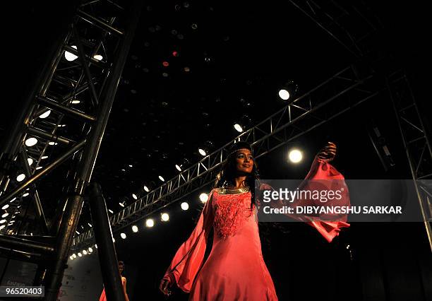 Indian models present the creations of designer Preeti Chandra during the second day of the Bangalore Fashion Week in Bangalore on January 29, 2010....