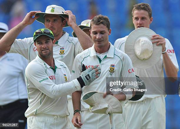 Mark Boucher congratulates south Africa teammate Dale Steyn after their win by an innings and 6 runs during day 4 of the 1st test between India and...