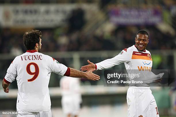 Julio Baptista with his teammate Mirko Vucinic of AS Roma celebrate the victory after the Serie A match between Fiorentina and Roma at Stadio Artemio...