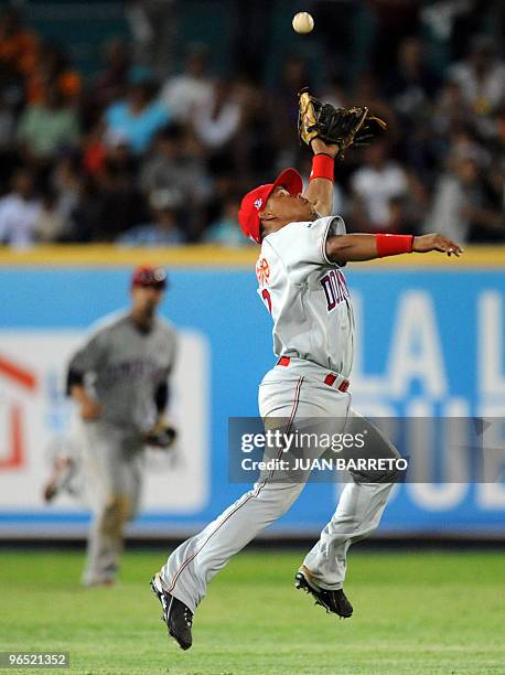 Dominican Ramon Santiago of Leones del Escojidos makes an out during a Caribbean Series baseball match against Indios de Mayaguez of Puerto Rico at...