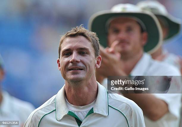 Dale Steyn of South Africa smiles as he walks off after his team's win by an innings and 6 runs during day 4 of the 1st test between India and South...