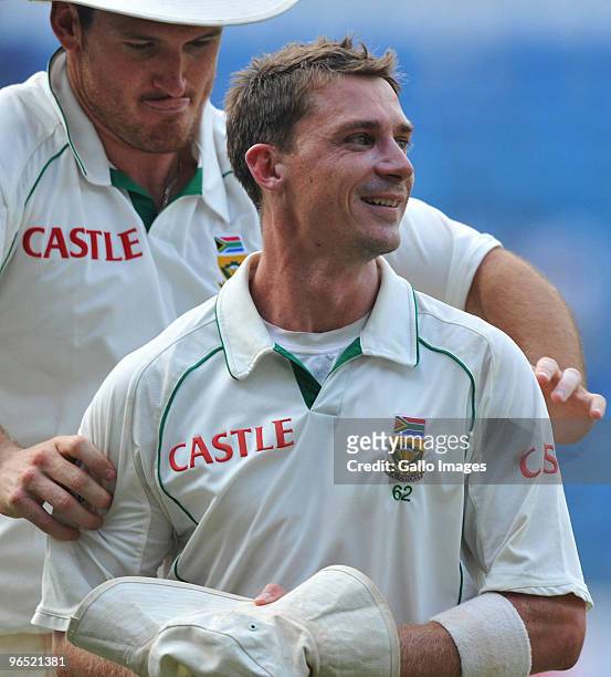 Dale Steyn and Graeme Smith of South Africa celebrate winning by an innings and 6 runs during day 4 of the 1st test between India and South Africa at...