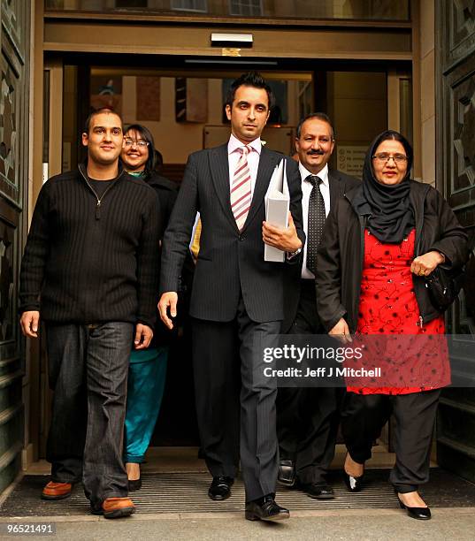 Mohammed Atif Siddique walks free from Court of Criminal appeal with his mother Parveen and father Atif and his lawyer Amaar Anwar on February 9,...