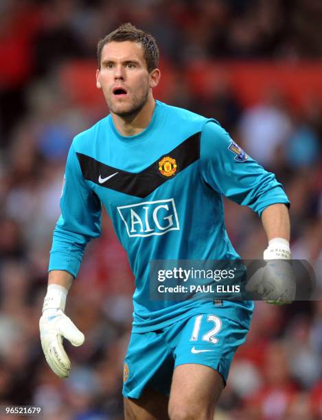 Manchester United's English goalkeeper Ben Foster in action during their English Premier League football match against Arsenal at Old Trafford in...