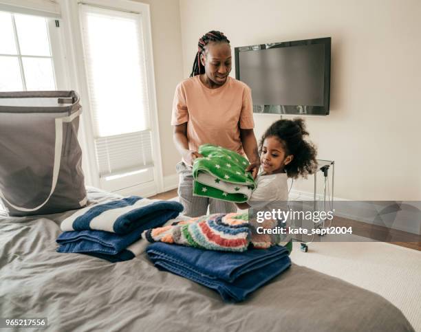 chores for little kids - clean clothes stock pictures, royalty-free photos & images