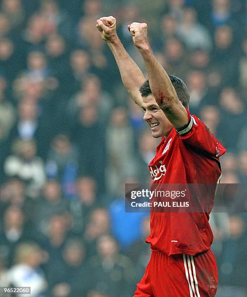 Liverpool's English midfielder Steven Gerrard celebrates after they beat Everton 1-0 in the English Premier League football match between Liverpool...