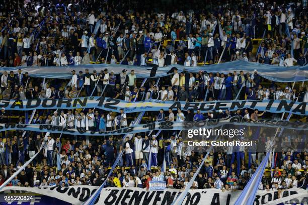 Fans of Argentina cheer for their team during an international friendly match between Argentina and Haiti at Alberto J. Armando Stadium on May 29,...