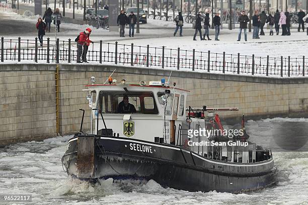 The icebreaker "Seeloewe" makes its way through ice on the Spree river on February 9, 2010 in Berlin, Germany. The "Petra" cold front is predicted to...