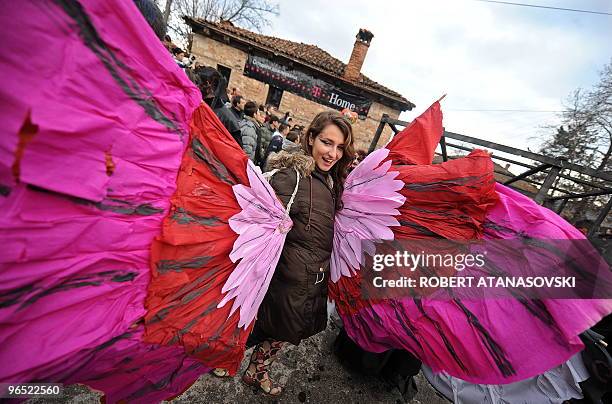 Girl takes part in the carnival parade on the streets of the town of Vevchani, 180 kilometres southwest from Skopje, on January 13, 2010. The...