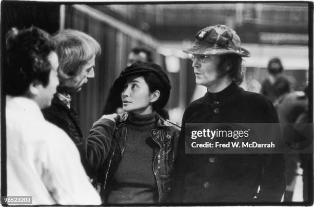 Japanese-born American artist and musician Yoko Ono and her husband British musician John Lennon attend the Eighth Avant Garde Festival at the 69th...