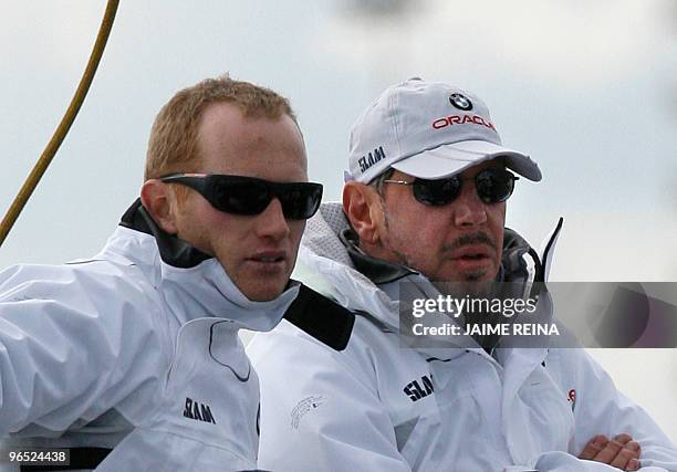 Oracle's owner Larry Ellison and Oracle's Australia's helmsman James Spithill sail at Valencia's harbour on February 09, 2010. A lack of wind led...