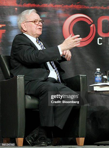 Warren Buffett, chairman and chief executive officer of Berkshire Hathaway Inc., speaks during a book promotion event with former U.S. Treasury...