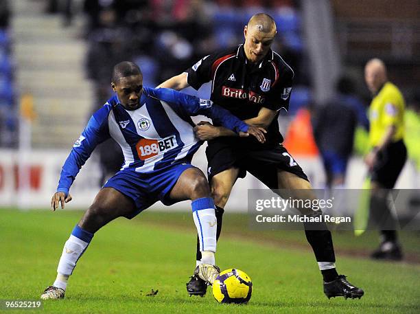 Charles N'Zogbia of Wigan battles Andy Wilkinson of Stoke during the Barclays Premier League match between Wigan Athletic and Stoke City at the DW...