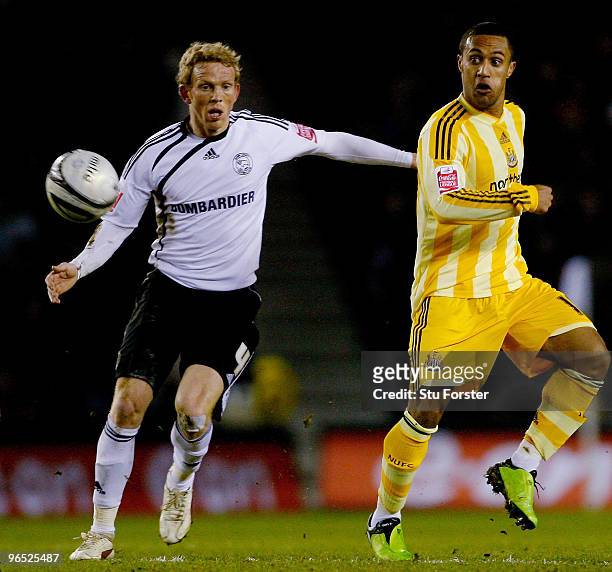 Wayne Routledge of Newcastle goes past Paul Green of Derby during the Coca-Cola Championship match between Derby County and Newcastle United at Pride...