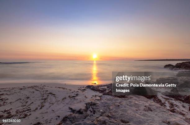 es pujols beach in formentera at dawn balearic islands, spain - pola damonte stockfoto's en -beelden